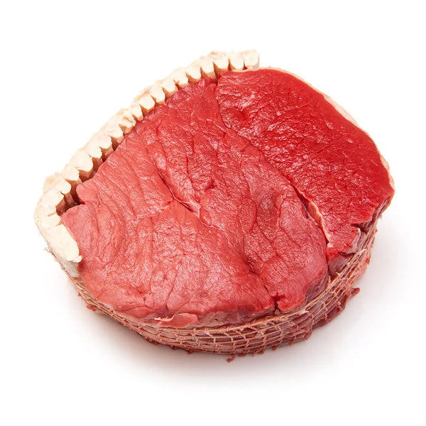 Raw British beef roasting joint on a white background – buy beef online