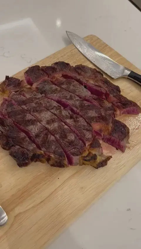 20oz XL sirloin dinner-plate steak, cooked and sliced