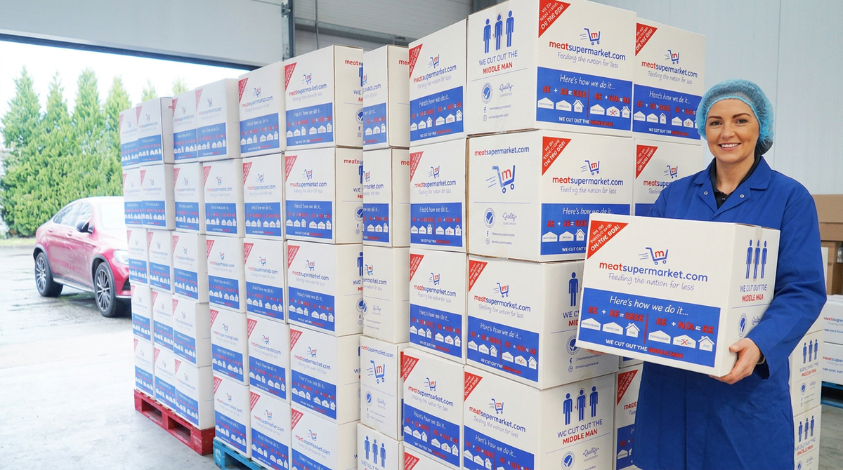 Our packer in front of stacks of meatsupermarket.com boxes ready for UK meat delivery