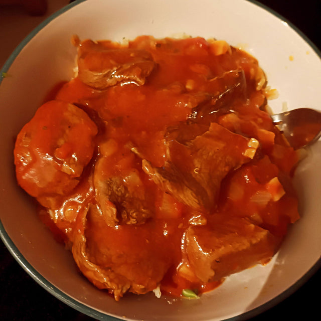 Customer review photo: ginger and lime marinated chicken thighs in a bowl